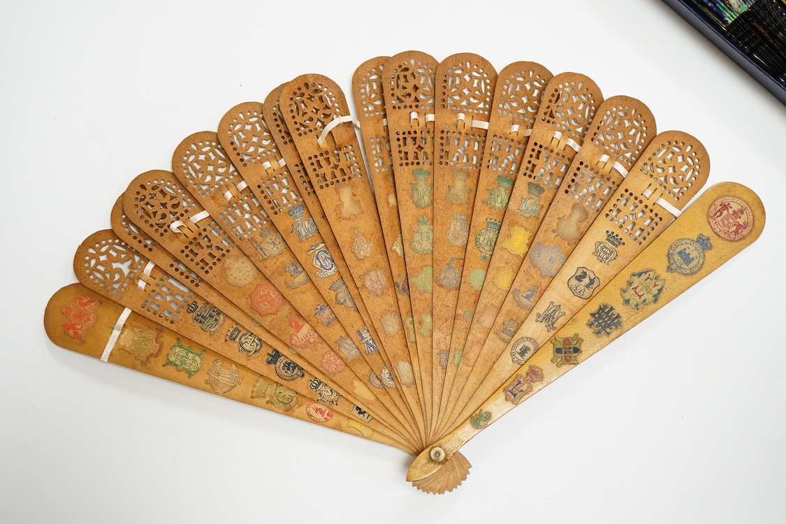 An unusual 19th century Chinese export gilt-decorated tortoiseshell and painted leaf fan, two English fans decorated with paper printed paper crests and a single sided Canton fan leaf lacking sticks, largest 23cm in leng